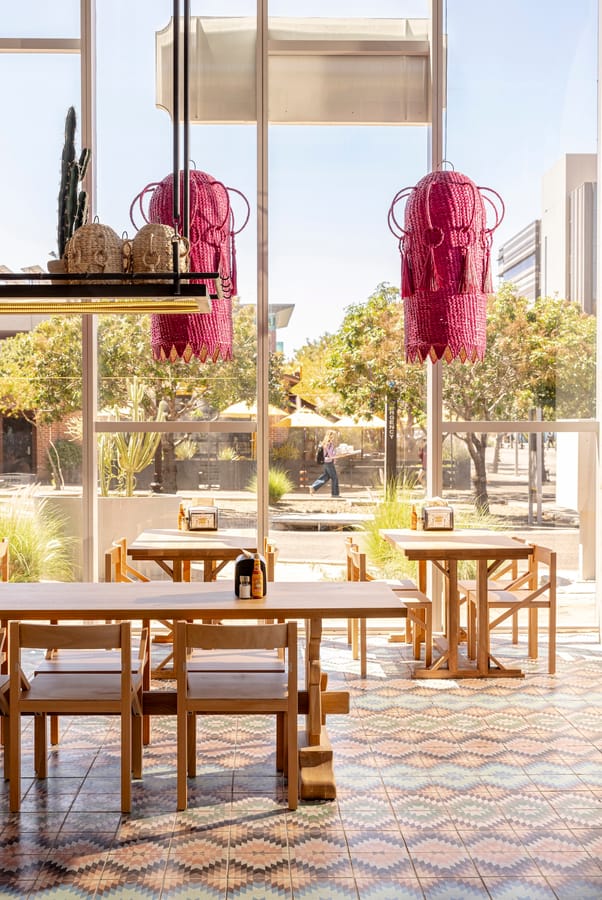 Taco Chelo Tempe - Group Table and Pink Lamps - photo courtey of J Lauren PR