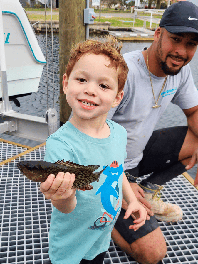 Stanley holding fish