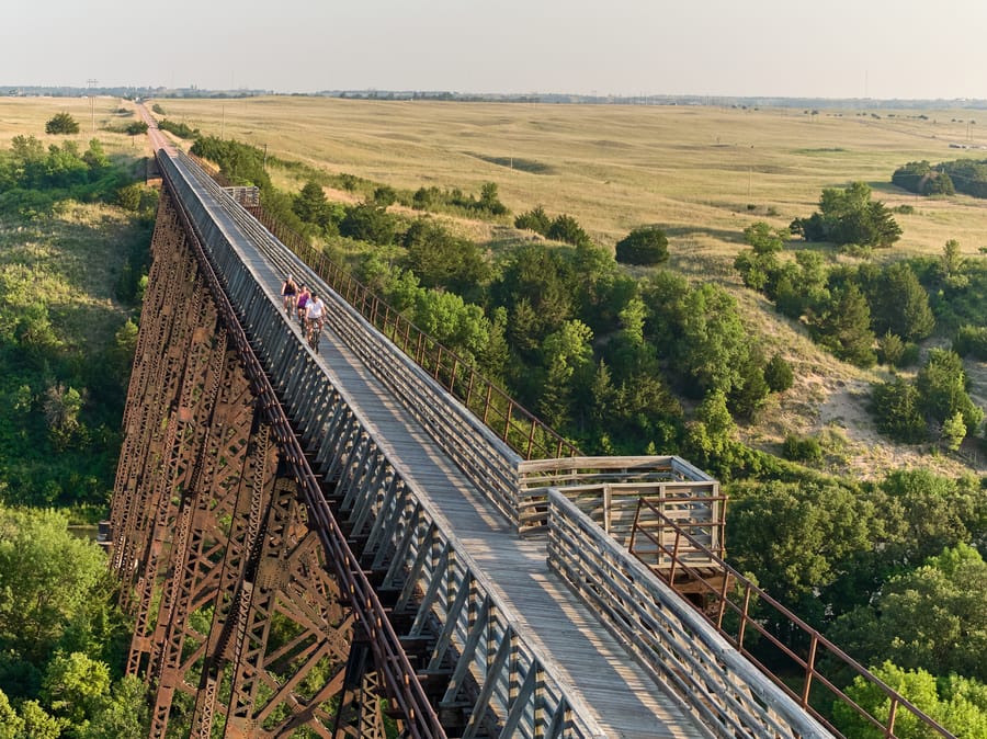 Cowboy Trail Bridge_Bikers Crossing Bridge_Clay Cook Shoot 2024