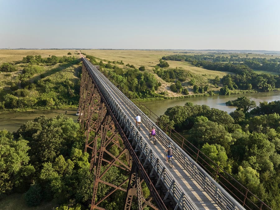 Cowboy Trail Bridge_Bikers Crossing Bridge_Clay Cook Shoot 2024