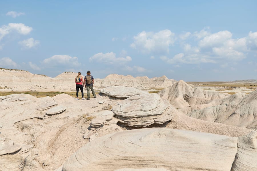 Toadstool Geological Park_Hikers Admiring View_Clay Cook 2024