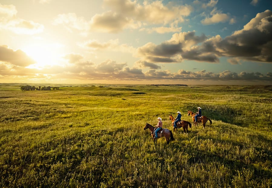 Calamus Outfitters_Horseback Riders at Sunset_Clay Cook Shoot 2024