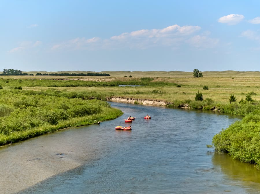 Calamus Outfitters_Tubers in Reservoir_Clay Cook Shoot 2024