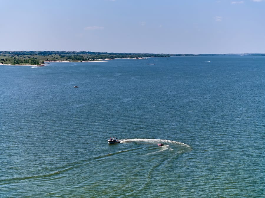 Calamus Reservoir_Speed Boat with Tuber_Clay Cook Shoot 2024