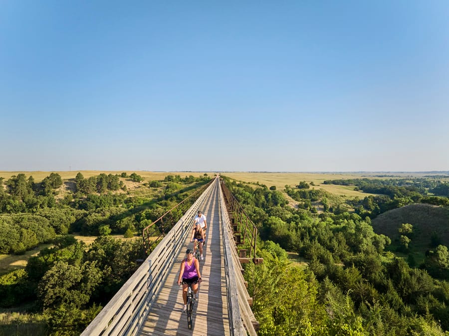 Cowboy Trail Bridge_Cyclists_Clay Cook Shoot 2024