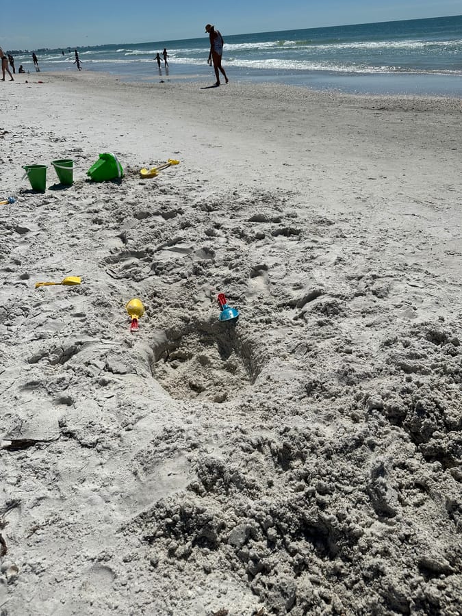 Hole in the Sand on the beach