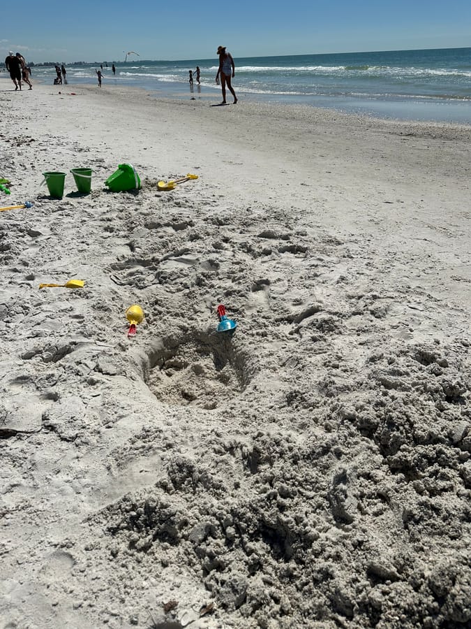 Hole in the Sand on the beach