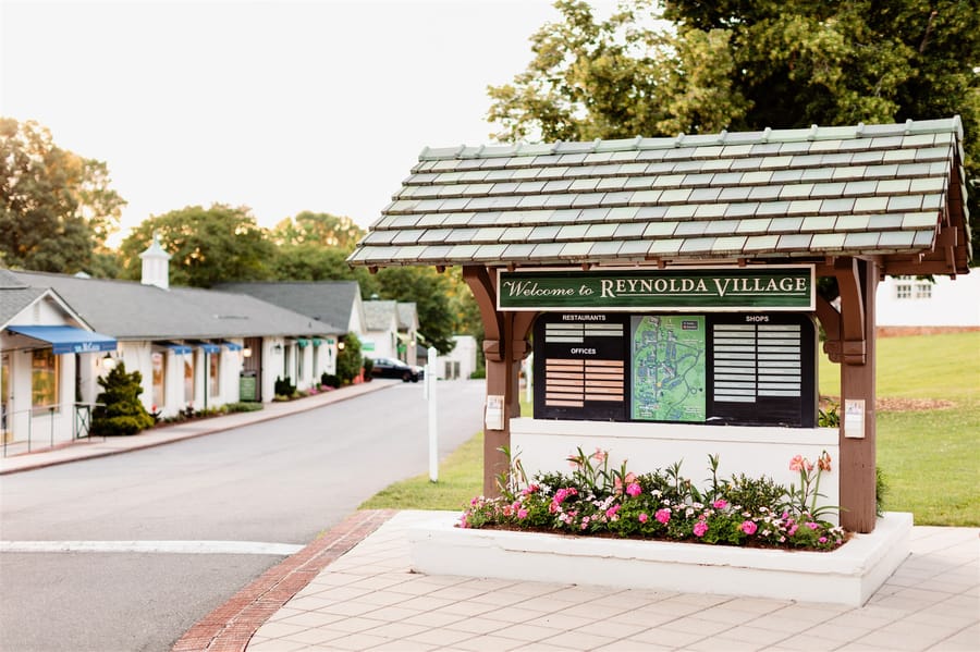Reynolda Village sign and long shot of Village