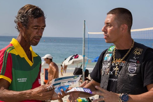 Evangelical Christians from Bola na Rede in Rio de Janeiro hands out leaflets raising awareness about the sexual exploitation of children during the World Cup