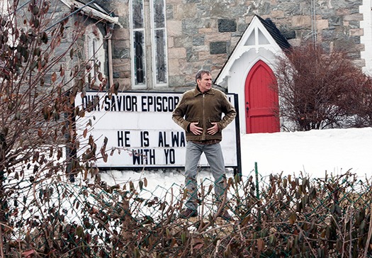 Rev Matt puts letters up on the church marquee