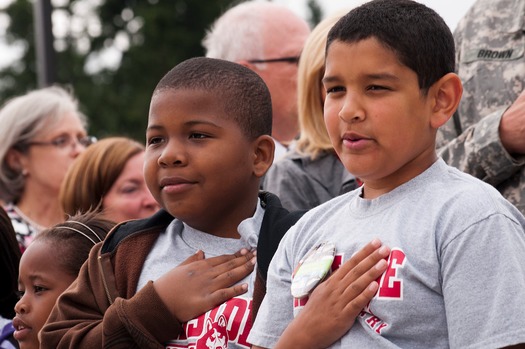 Children_recite_the_Pledge_of_Allegiance_during_a_groundbreaking_ceremony_signifying_the_official_start_of_a_yearlong_construction_project_to_completely_rebuild_the_installations_Hillside_and_Carter_Lake_120730-A-AJ780-005