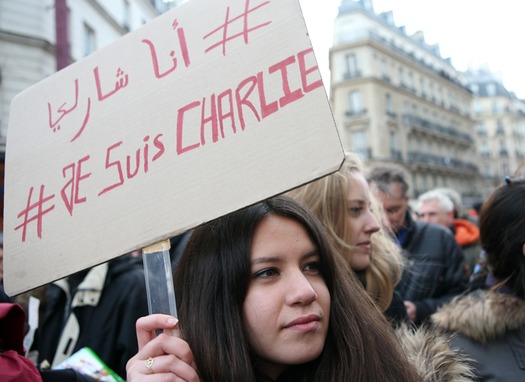 Muslim student at mass rally in Paris