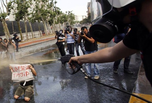 police using tear gas on protestors.