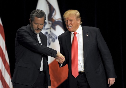 thumb Donald Trump shakes hands with Jerry Falwell Jr. during a campaign event in Sioux City Iowa