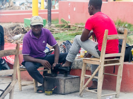 PRINT Street vendors work on the Jeremie town square on October 12, 2016.