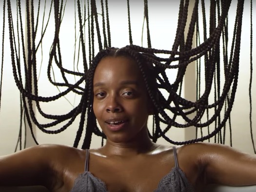 PRINT Artist Jamila Woods in her new music video “Holy.” Screenshot from YouTube