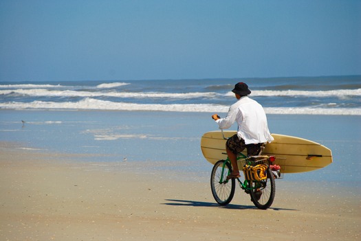 surfer on bike