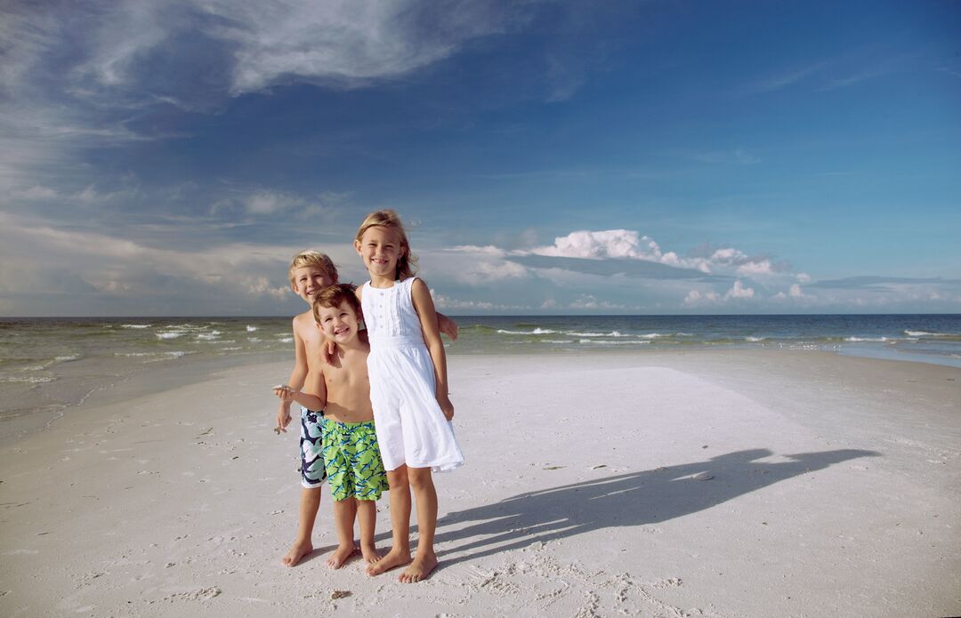 KIDS ON SANDBAR ON AMI