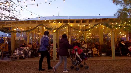 Winterfest - Travel left - People in rocking chairs wearing blankets