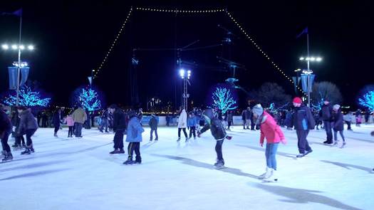 Winterfest - Wide - People skating, ship lights in background