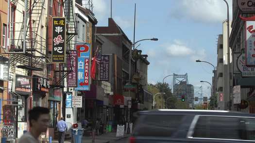 Chinatown, street banner pan down to Race