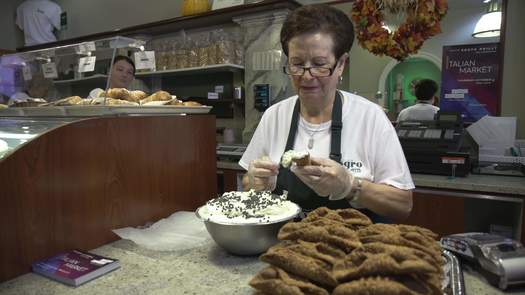 Isgro Pastries stuffing cannoli