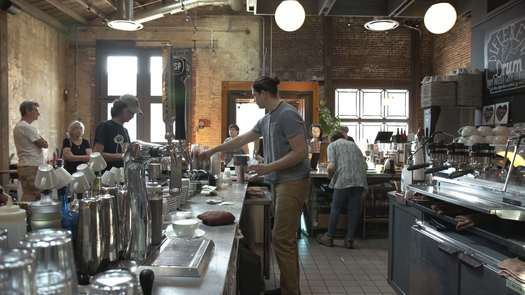 La Colombe Coffee Roasters behind the counter