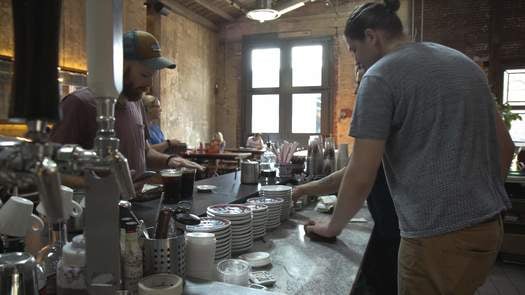 La Colombe Coffee Roasters behind the counter