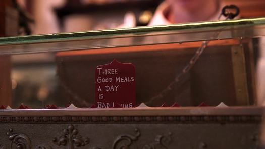 Franklin Fountain cash register closeup with sayings