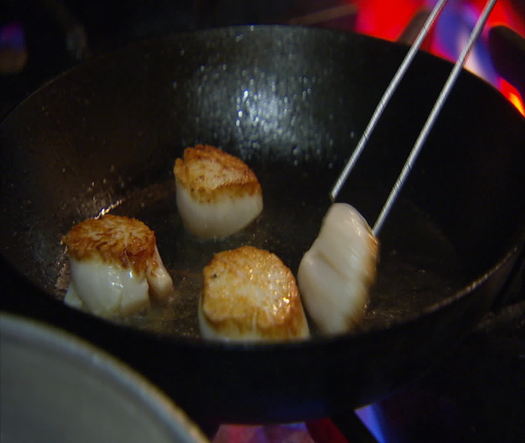 Fork cooking food closeup