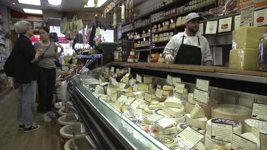 Di Bruno Bros. cheese monger serving customers