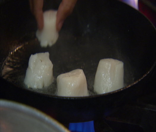 Fork cooking food closeup