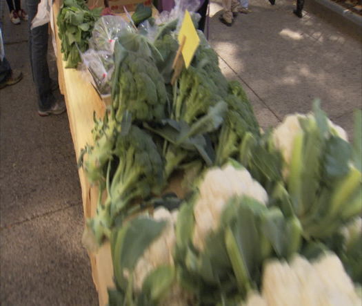 Rittenhouse Square Farmers’ Market -  Pan across fresh produce to people buying