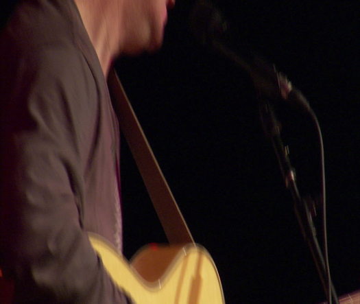 World Café Live CU guitar tilt up to artist
