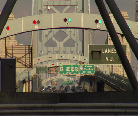 Benjamin Franklin Bridge, train going by