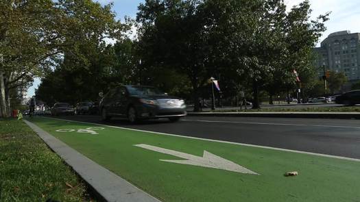 Bike Lane on Benjamin Franklin Parkway, bicyclists going by