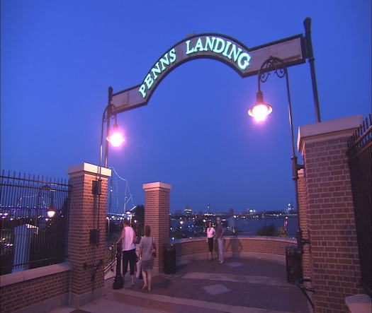 Penn's Landing pedestrian entrance sign at night