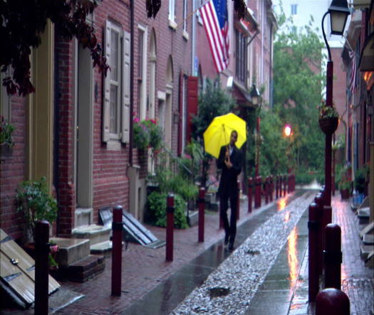 Elfreth's Alley man with umbrella in rain