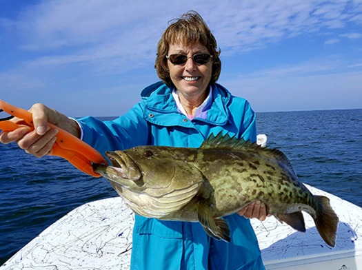 Fishing Lady with Grouper