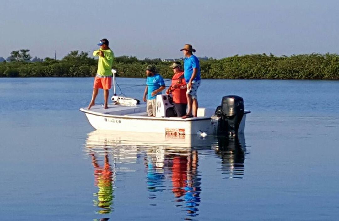 Group of Men Fishing from Boat on Florida's Adventure Coast