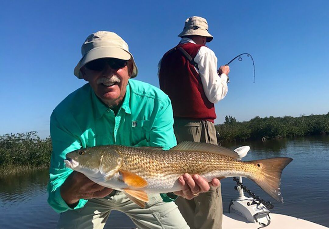 Angler with Redfish Catch on Florida's Adventure Coast