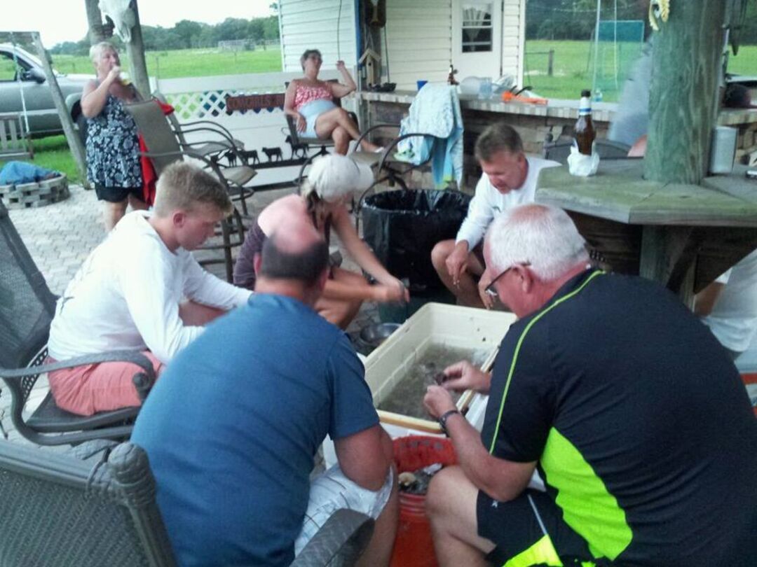 July 7, 2013 Harry Johnson cleaning fresh caught scallops