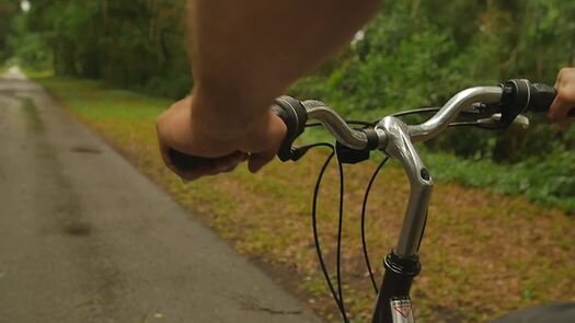 Bicyclist on Withlacoochee State Trail, Florida's Adventure Coast