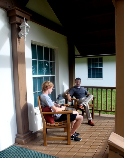 man boy on porch