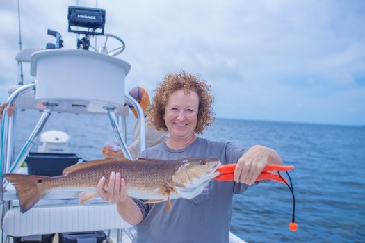 Great Catch-Redfish (photo by Visitors Bureau)