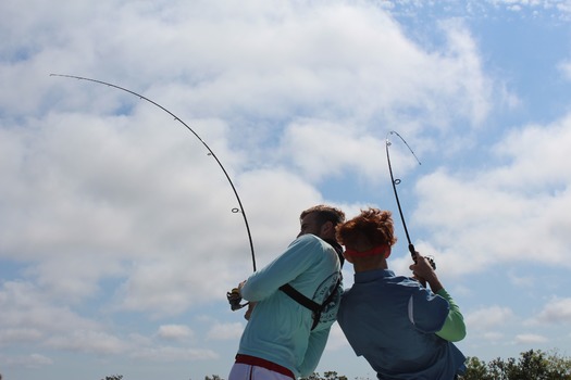 Ms. Kim and Son fishing with friends