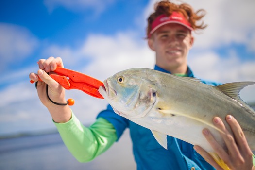 Ms. Kim and Son fishing with friends