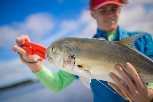 Ms. Kim and Son fishing with friends