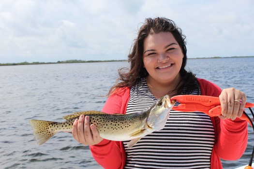 Ms. Kim and Son fishing with friends