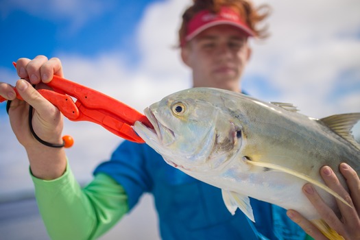 Ms. Kim and Son fishing with friends